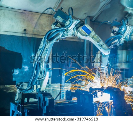 Robot welding movement Industrial automotive part in factory