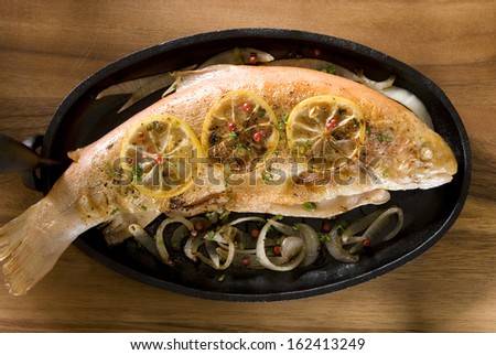 Overhead shot of a freshly baked golden trout.