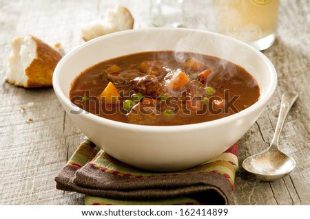 Closeup of steaming hot beef stew.