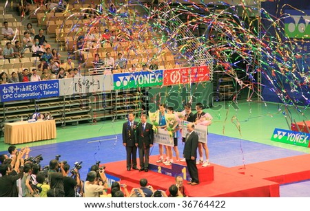 TAIPEI - AUG 30: Taiwan badminton players won the 2009 Yonex Chinese Taipei Badminton Open women\'s singles and men\'s doubles champion August 30, 2009 in Taipei, Taiwan.