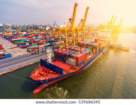 container,container ship in import export and business logistic.By crane ,Trade Port , Shipping.cargo to harbor.Aerial view.Water transport.International.Shell Marine.Top view.