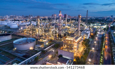 Oil refinery with a background of the city.The factory is located in the middle of nature and no emissions. The area around the air pure.business logistic.Aerial view .Top view.