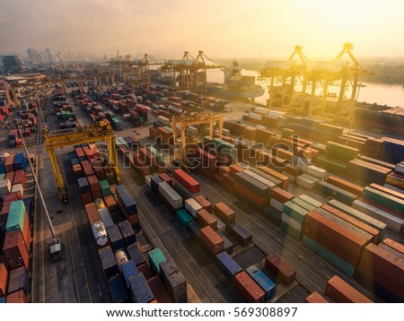container,container ship in import export and business logistic.By crane ,Trade Port , Shipping.cargo to harbor.Aerial view.Top view.