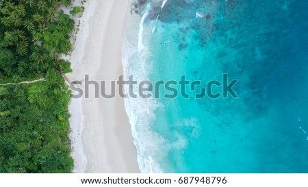 Sea aerial view,Top view,amazing nature background.The color of the water and beautifully bright.Azure beach with rocky mountains and clear water of Thailand ocean at sunny day. Landscape background