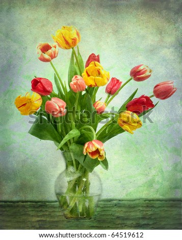 green and grungy art of tulips in glass vase
