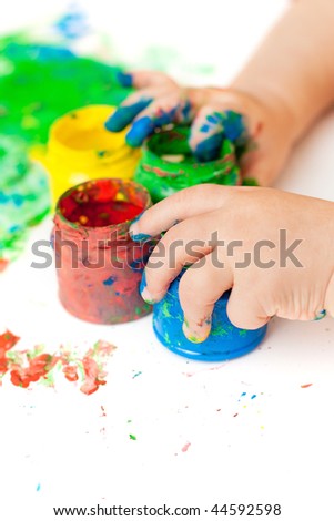 baby hands holding paint buckets