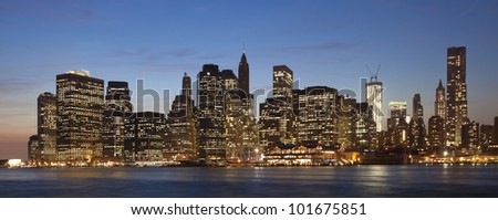 The New York City skyline at twilight with the Freedom tower