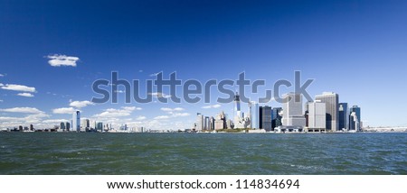 The New York City and New Jersey skyline at afternoon w the Freedom tower and Brooklyn bridge