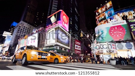 NEW YORK CITY SEPT 26 Times Square featured with Broadway Theaters Taxi Cabs and animated LED signs is a symbol of New York and the United States September 26 2012 in Manhattan New York City NEW YORK CITY SEPT 26 Times Square featured with Broadway Theaters Taxi Cabs and animated LED signs is a symbol of New York and the United States September 26 2012 in Manhattan New York City