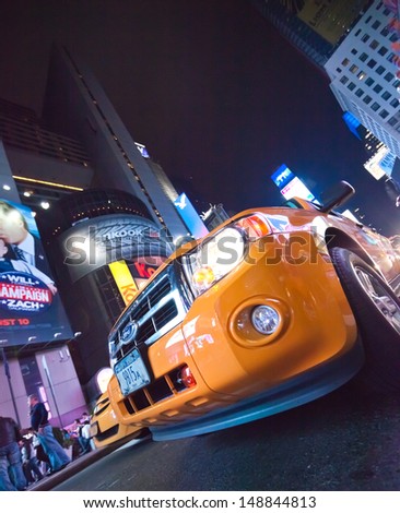 NEW YORK CITY, USA-SEPTEMBER 21: Times Square, featured with Theaters, Taxi Cabs, Luxury Limousines and animated LED signs, is a symbol of New York City. Taken in New York City on September 21, 2012