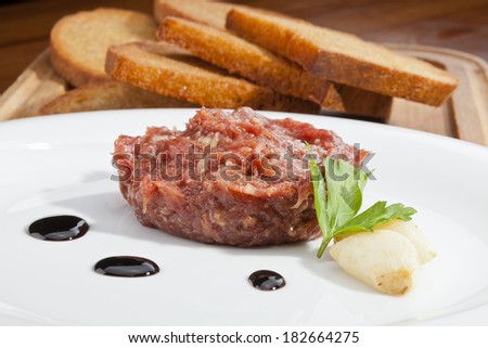 Steak tartar ready to eat on the plate