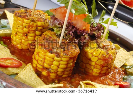 Baked corn with salsa and tortilla chips