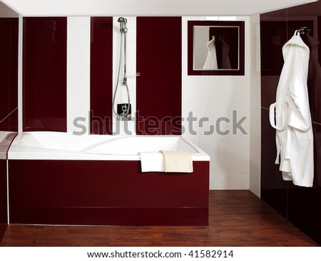 Bathroom on The Luxury Bathroom With The Mosaic And Dark Red Tiles Stock Photo