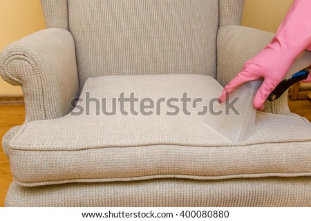 Sofa or armchair chemical cleaning with professionally extraction method. Early spring cleaning or regular clean up.