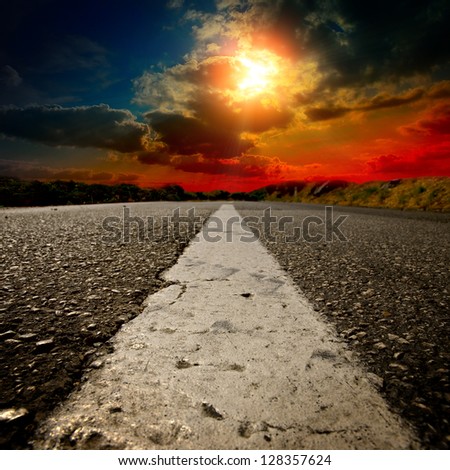 asphalt road with the blue sky