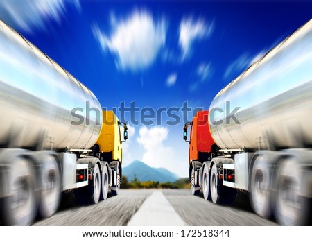 the big trucks on the asphalt road