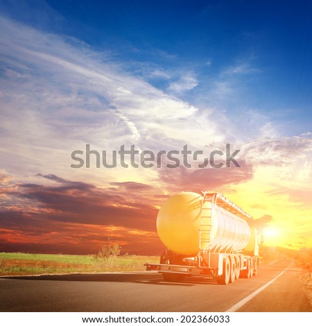 The truck and highway at sunset