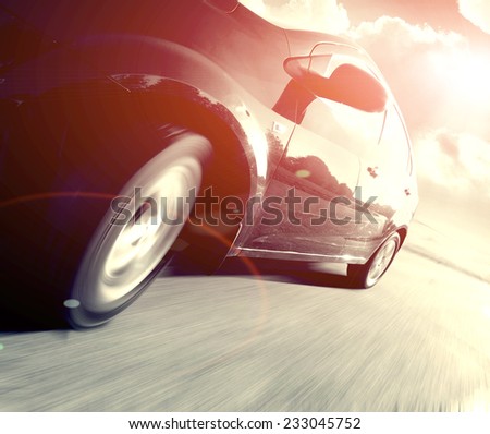 The Side view of black car in turn