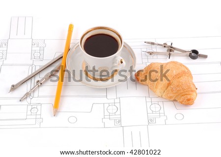 cup with coffee on the draft with instruments
