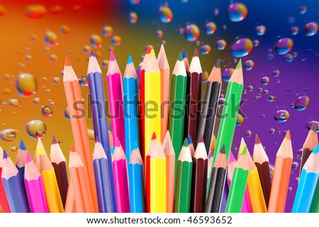 many crayons on a white background