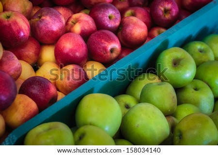 Fresh organic apples, green and red apples, red delicious and granny smith apples