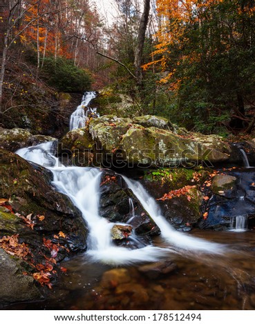 Streaming water and waterfall in fall colors, smoky mountains