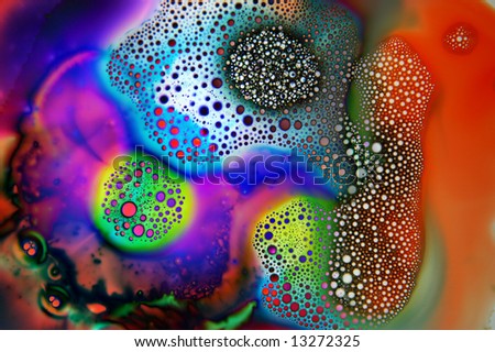 Grunge abstract background of cell like structures and bubbles on a multicolored yellow background