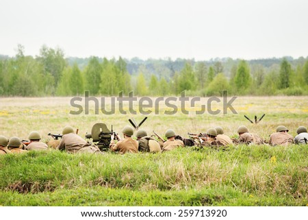 Reconstruction of the battle of World War II. Soviet soldiers in trench.