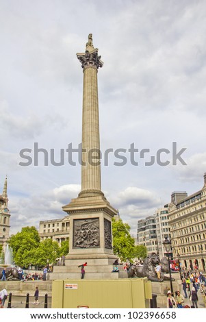 LONDON - MAY 13: Trafalgar Square and the Monument to the Great Fire, on May 13, 2011 in London, England. The Monument  is a stone Roman Doric column, which commemorates the Great Fire of London.