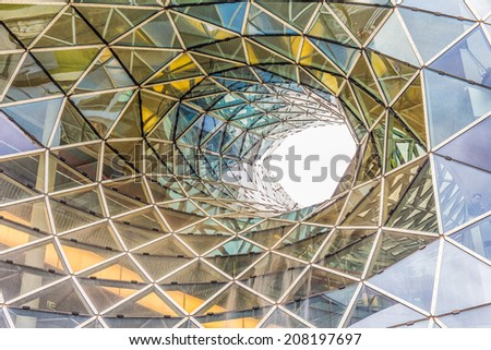 FRANKFURT, GERMANY - MARCH 1, 2014: Architectural details of the MyZeil shopping mall in Frankfurt. The famous shopping center has a modern design and the longest escalator in Germany.