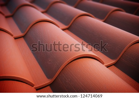Close up of red roof tiles.