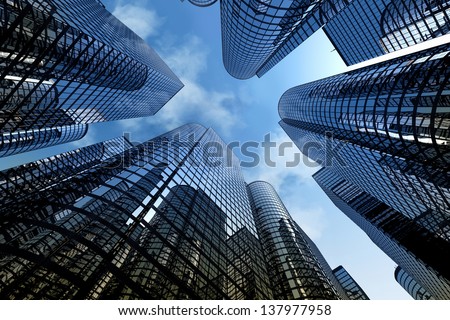 Low angle shot of modern glass city buildings with cloudy sky background.