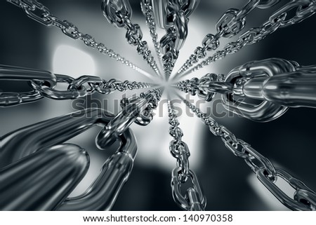 Reflective chrome chain on a dark background. Can be associated with strength, connection, industry or imprisoning. Bottom view.
