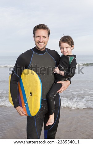 Father and Son Doing Water Sports