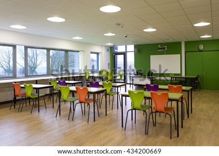 Landscape image of an empty classroom.