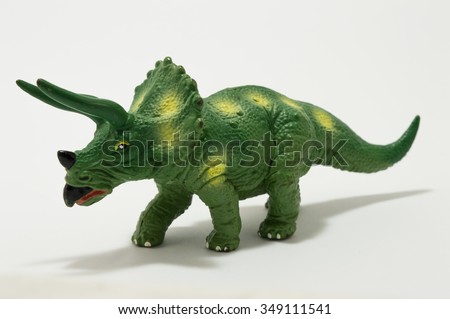 dinosaur toy figure isolated on white.
