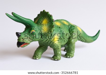 dinosaur toy figure isolated on white.
