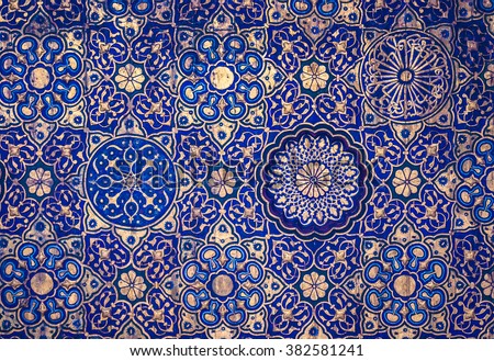 Gold and blue ceiling in a muslim mosque, islamic traditional religious ornament