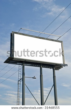 Blank billboard sign with electrical wire and clouds in the background.