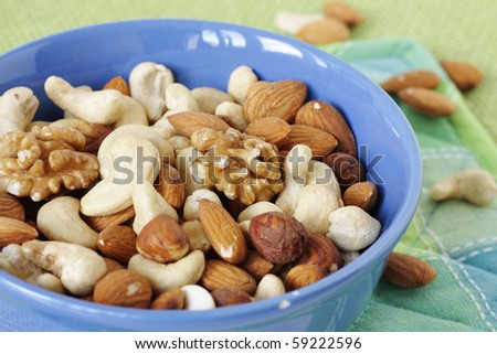 Mixture of nuts in blue bowl