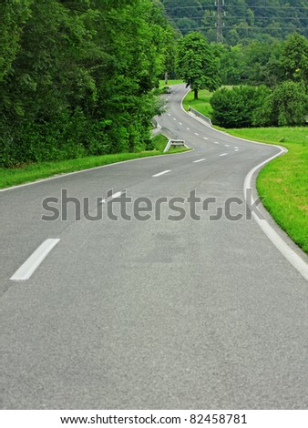 Asphalt winding curve road in nature