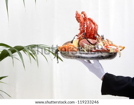 tray of seafood on hand