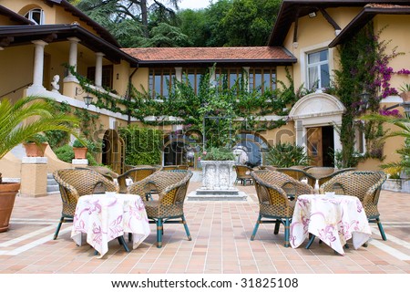 restaurant outdoors table facade patio village hotel