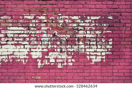 Magenta brick wall with old paper ad.