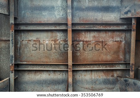 Rusty peeled heavy metal texture background. Transport container. Inside view.