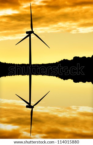 Windmill silhouette at sunset