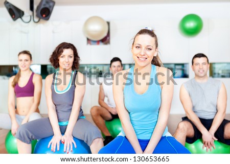 Group of people in aerobics class at the gym