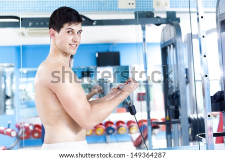 Handsome man training in the gym