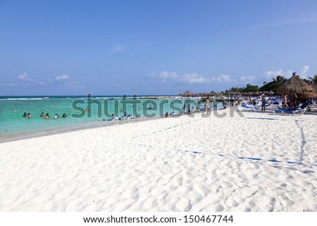 RIVIERA MAYA, MEXICO - AUGUST 9: People at the beach in RIVIERA MAYA on August 9, 2013, Mexico