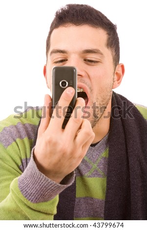 young man scream to the phone, isolated on white